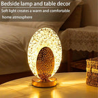 Decorative bedside lamp on a table with soft light creating a warm atmosphere.